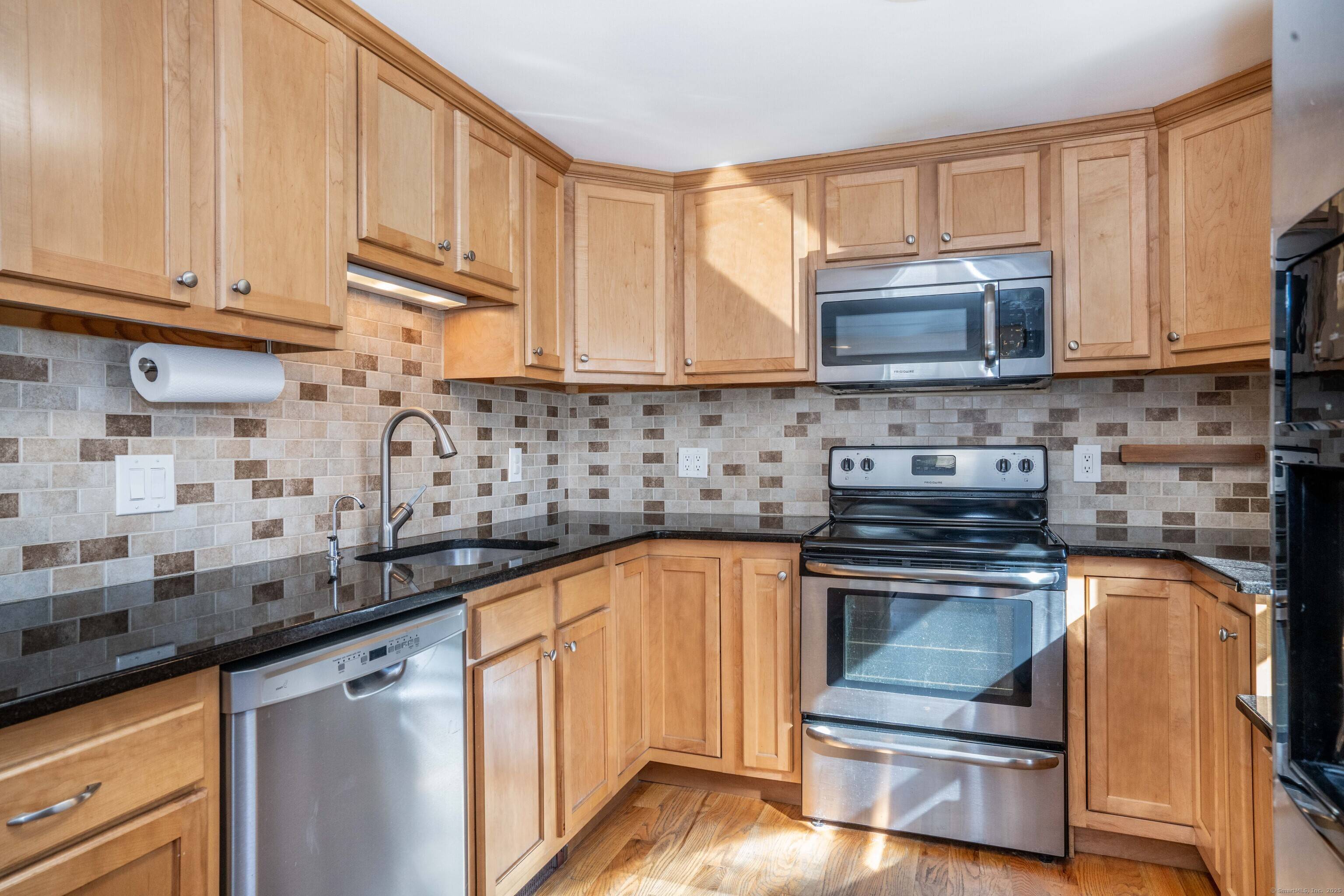 Welcome home to this beautifully maintained 3 bedroom, 2 bath Cape, perfectly situated within walking distance to schools and Simsbury's vibrant town center.
