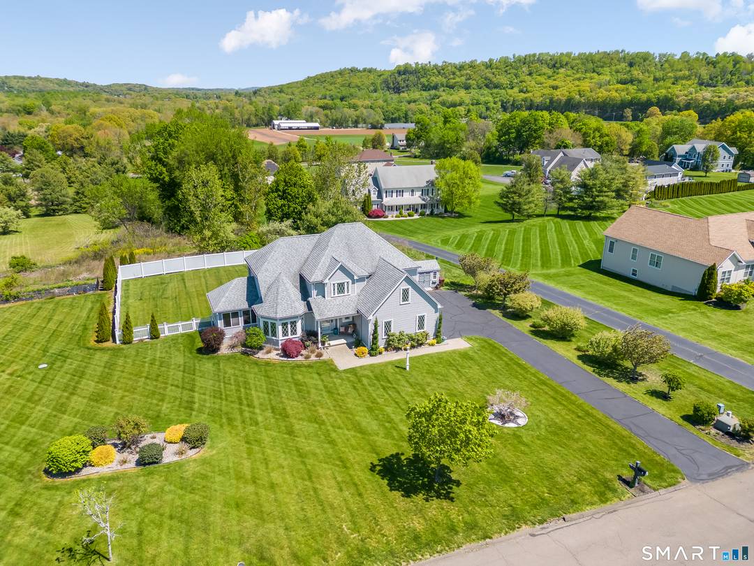 Rarely does a home with this level of design, setting, and neighborhood appeal become available in North Branford !