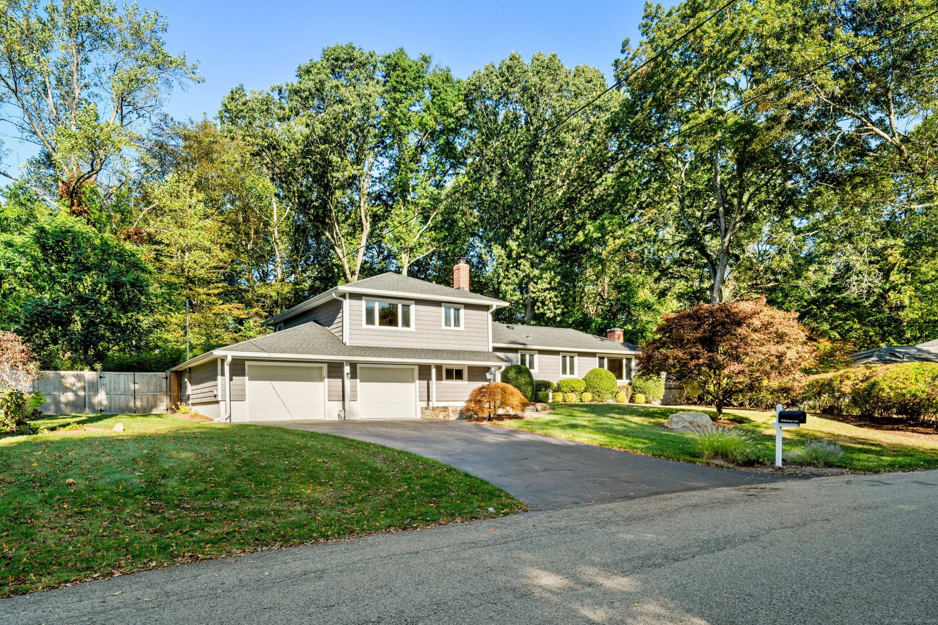 Welcome to 70 Winding Lane, a delightful split level home nestled in the Cranbury area of Norwalk, CT.