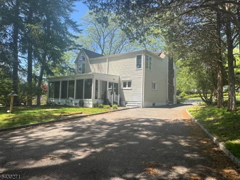 Spacious 5 bedroom, 3 full bath Colonial located in the heart of Livingston.