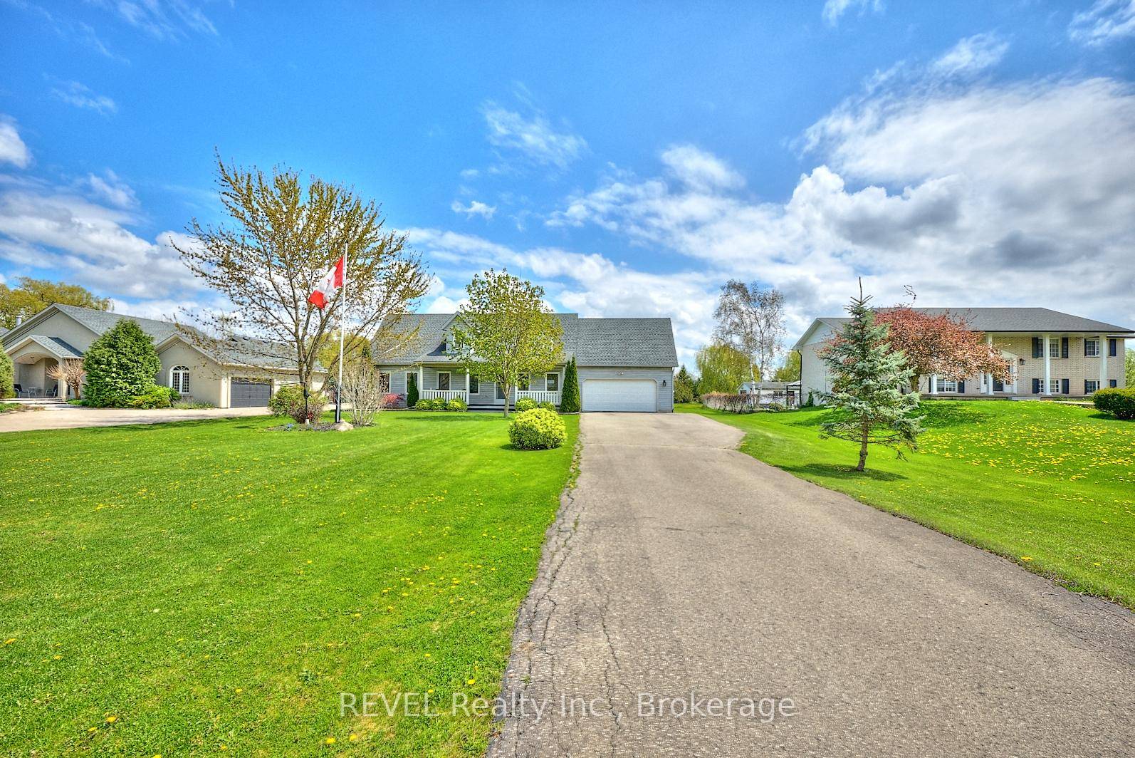 This custom built 1. 5 storey Cape Cod style home offers over 2, 200 sq ft of finished living space on a generous lot just over half an acre.