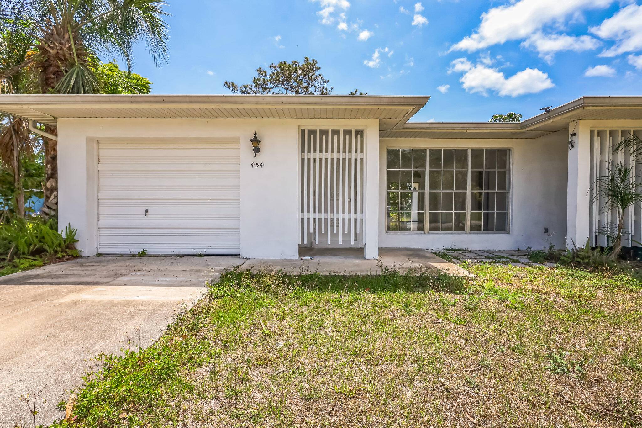 Welcome to 434 SE Tranquilla Avenue, a charming 2 bedroom, 2 bathroom single family home nestled in the peaceful River Park neighborhood of Port St.