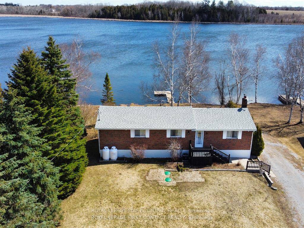 Experience the ultimate lifestyle at this stunning, fully renovated waterfront bungalow cottage on Lake Scugog !