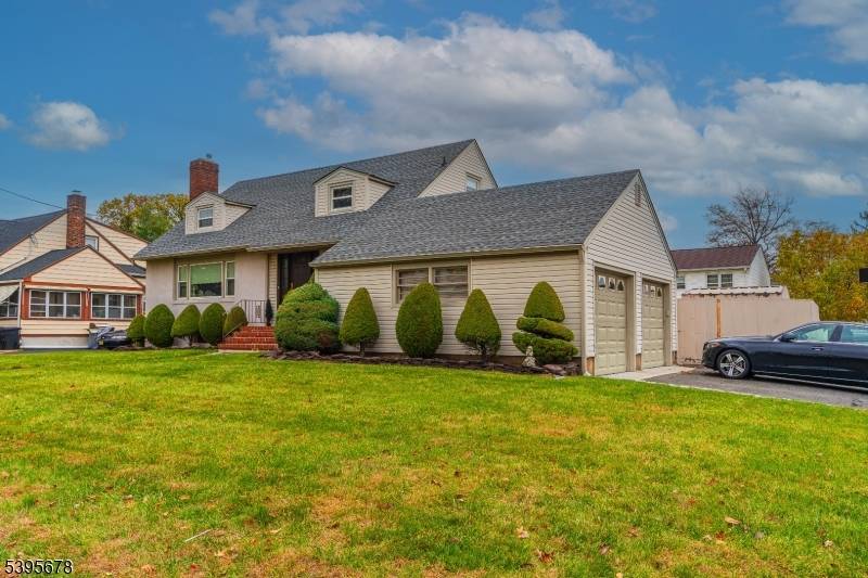 Welcome to your storybook Cape with vintage character and everyday comfort situated on a corner lot.