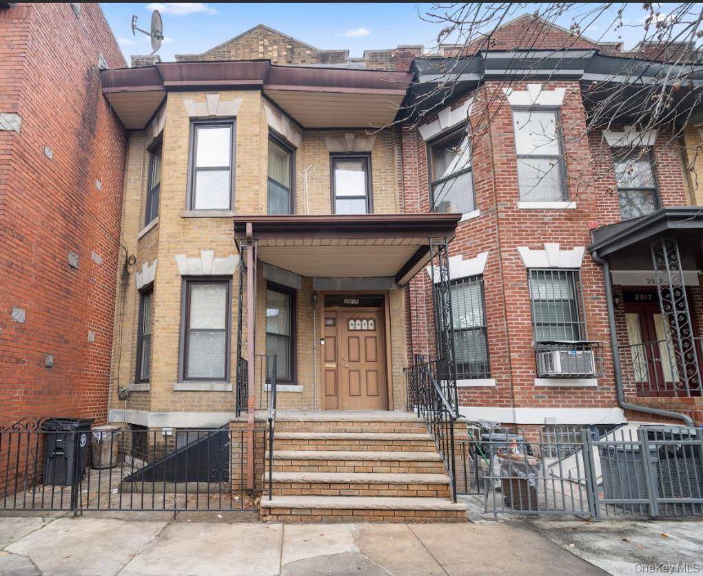 Well maintained brick two family home delivered vacant at closing.