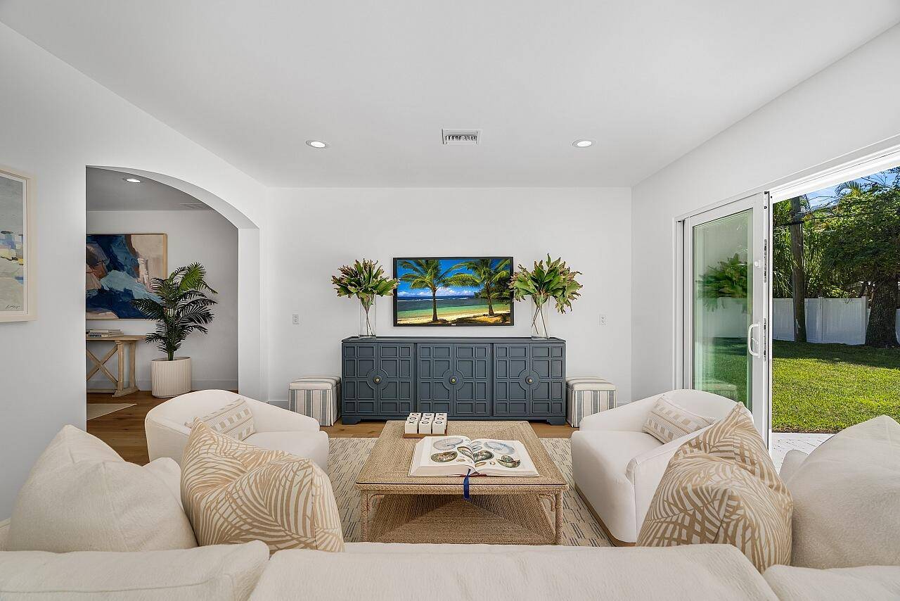 Modern meets Old Florida in this showstopper to the studs reno on a coveted.