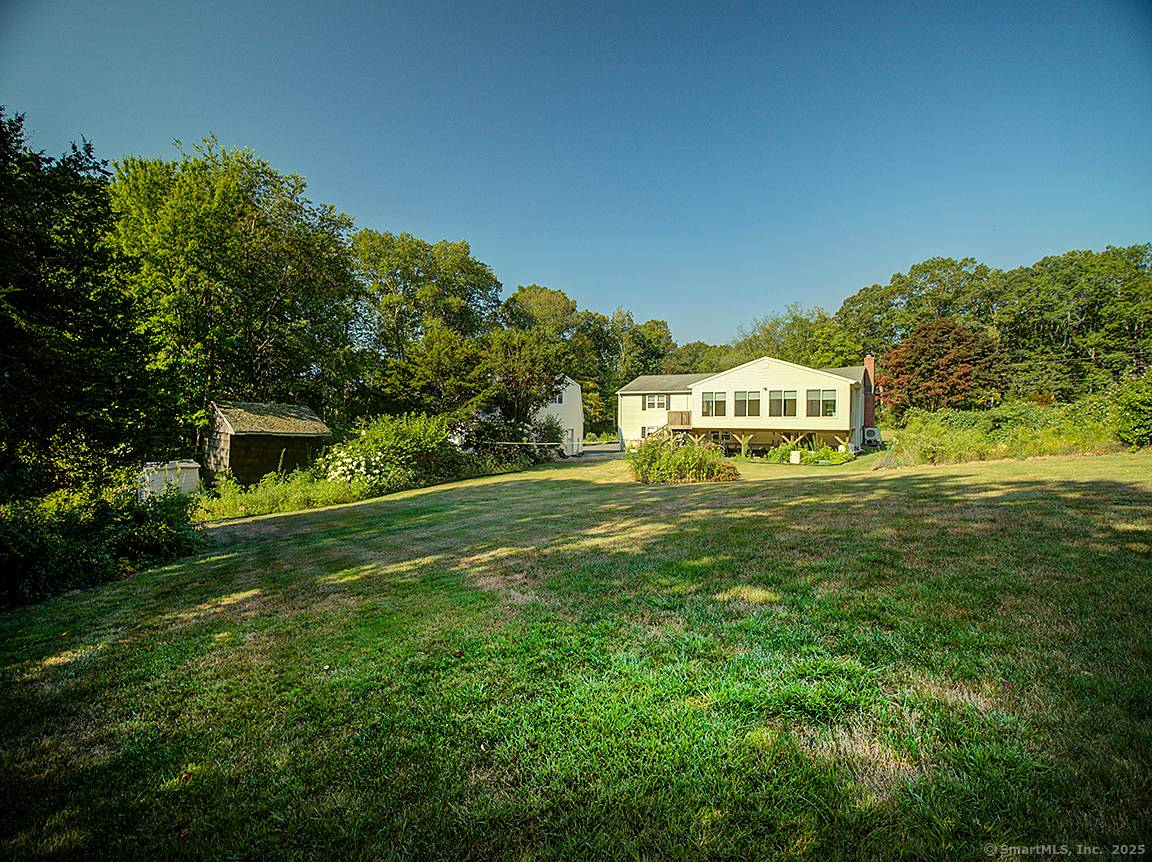 Beautiful House with lots of Flowers, 1668 above ground and 1300 finished lower level, 1.
