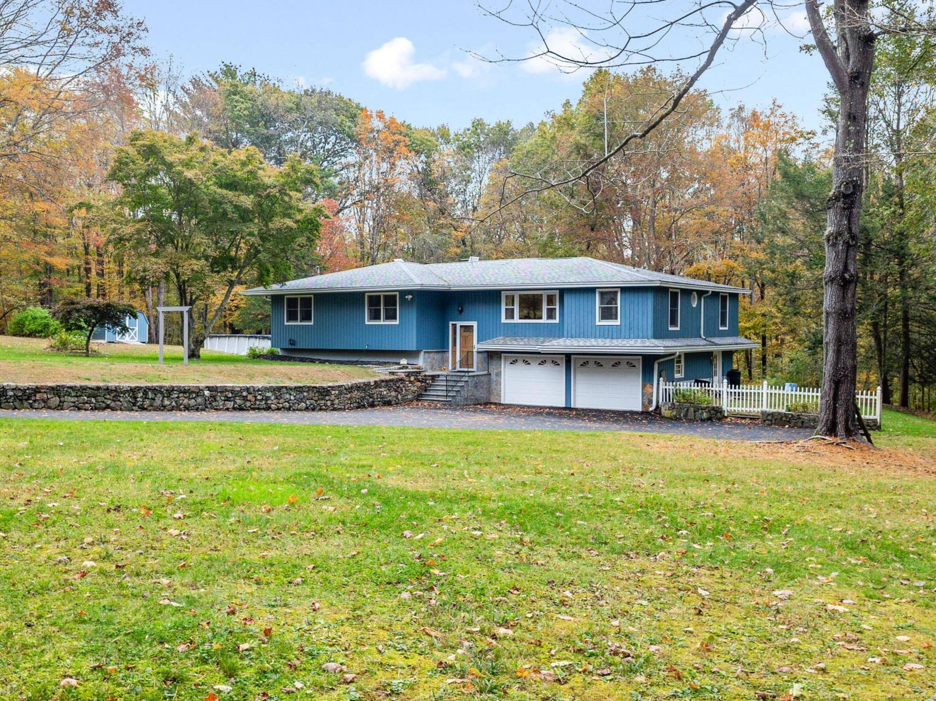 A private Brookfield retreat of style and serenity set on 2.