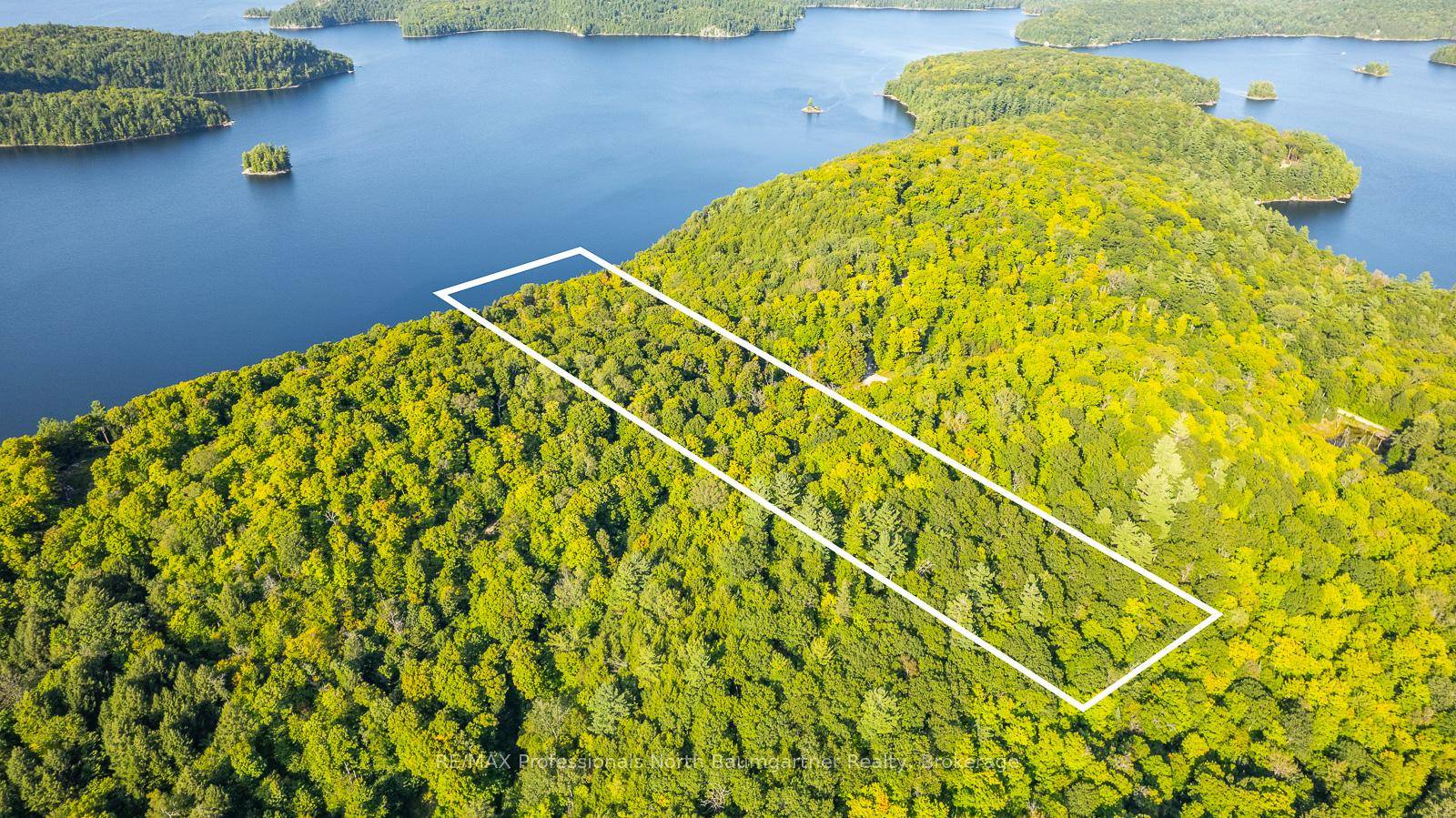 Discover the tranquil allure of Redstone Lake with this remarkable 18.