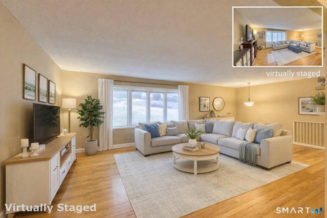 In Danbury, there is a 4 bedroom, 1 full and 2 half bath raised ranch offering 2, 196 square feet of comfortable living space, set on a spacious 0.