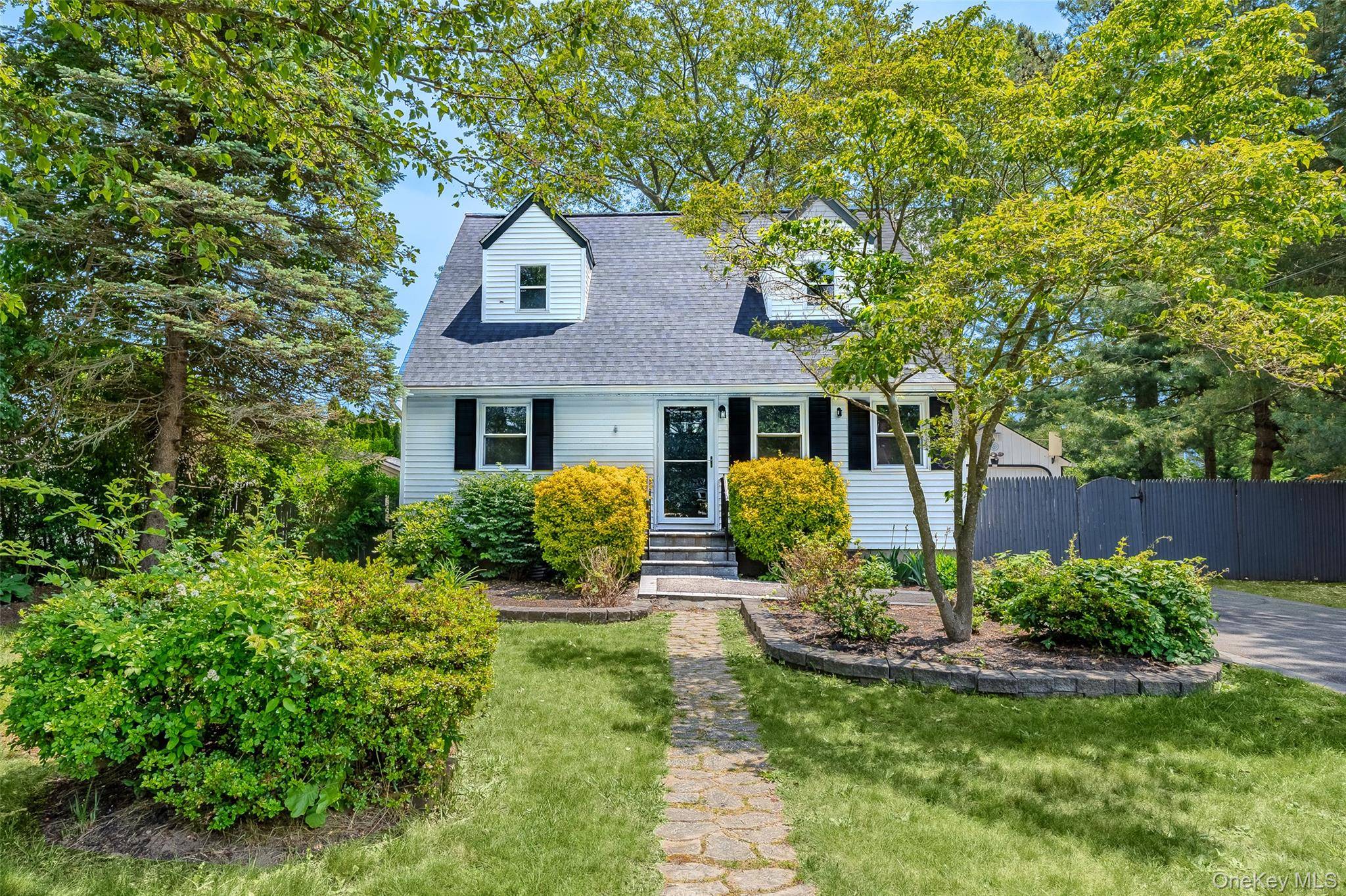 This Beautifully Renovated 4 bedroom, 2 bathroom home is set in the heart of Manor Park in the highly desirable Eastport South Manor School District.