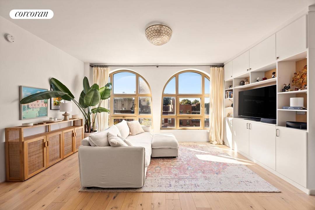 Come home to this super stylish, sunny and like new 2 bed, 1 bath condo WITH INDOOR PARKING in the most desirable spot in Park Slope !