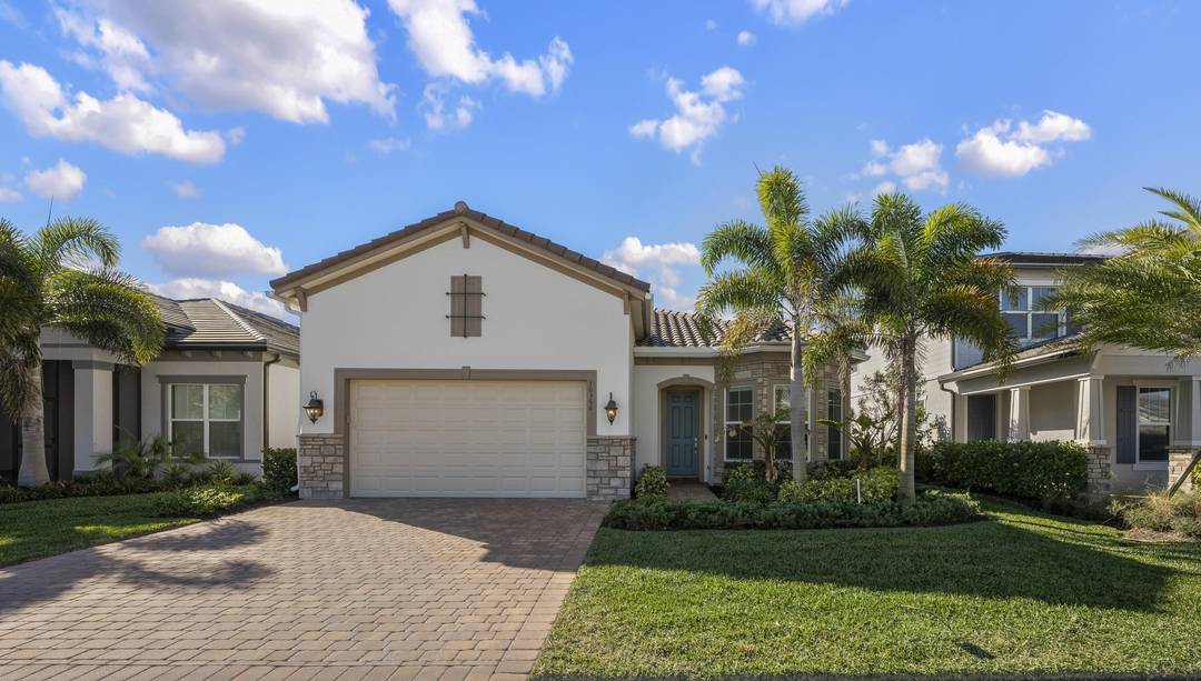 Welcome to luxury lakefront living in Avondale at Avenir, one of the most desirable communities within the master planned Avenir in beautiful Palm Beach Gardens.