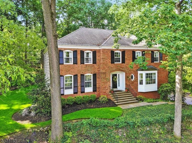 This 5 bedroom builders model home is located in a private setting with lush landscaping and seasonal views of the 7, 800 acre National Wildlife Refuge located just a few ...