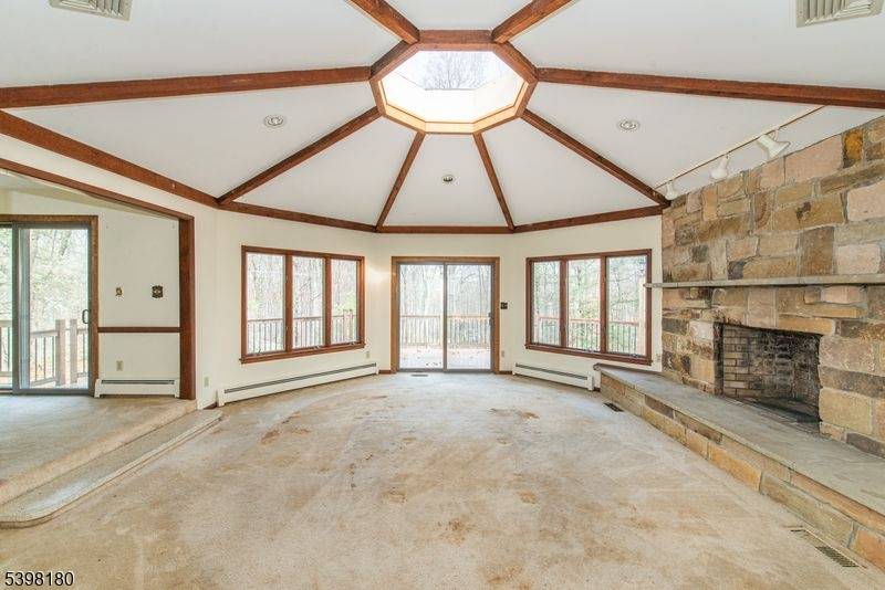 Incredible opportunity to own a sprawling 4 bedroom ranch home in Long Valley, with a full, finished, walk out, daylight basement with fireplace insert, a very large 2 car garage, ...