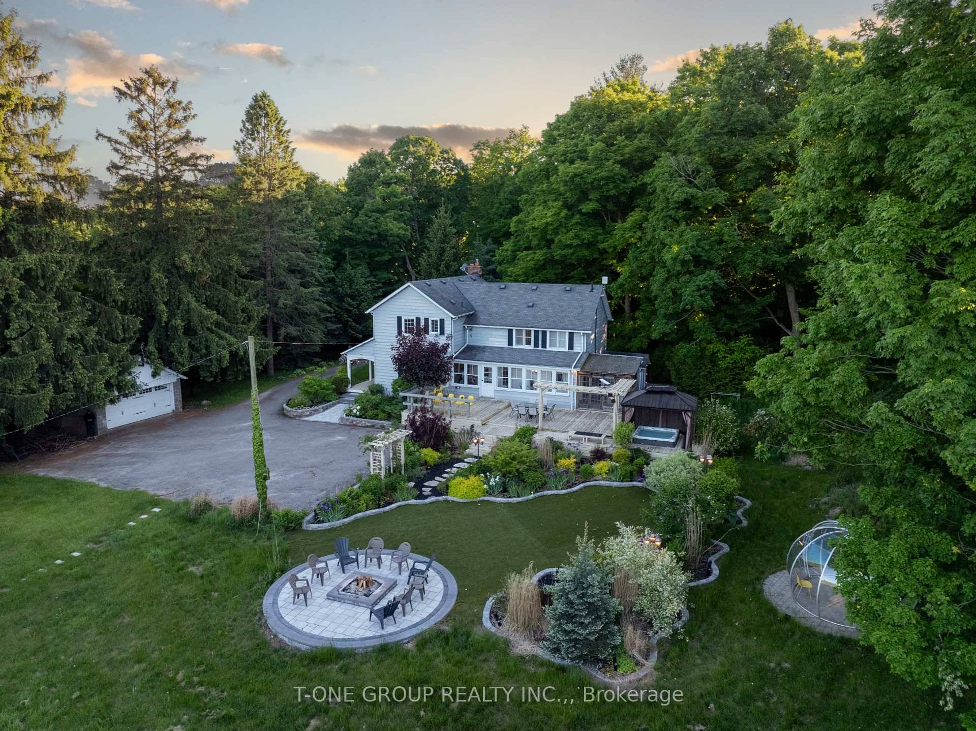 Charming country getaway on a beautiful 10 acre lot with a mix of hardwood and softwood trees, peaceful walking trails, and an open meadow with stunning sunset views.