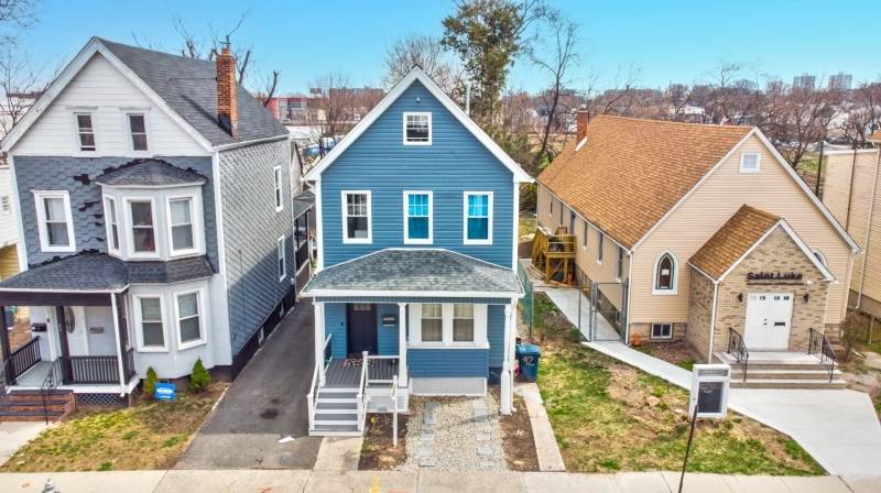 Welcome to 92 Steuben Street, a striking three story Colonial where classic elegance meets modern convenience.