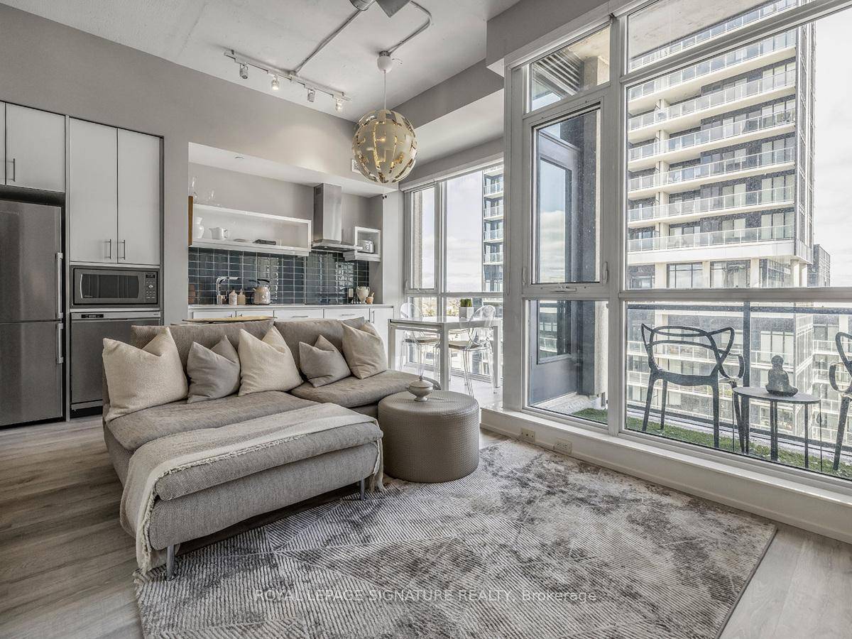 Come Live in Liv Lofts ! This beautiful, fully furnished loft style condo perfectly blends modern style and comfort.