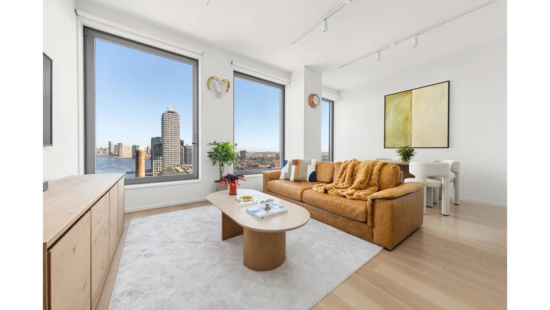 Framed by sweeping Manhattan skyline and East River views, this north facing one bedroom residence offers a bright, modern living experience.