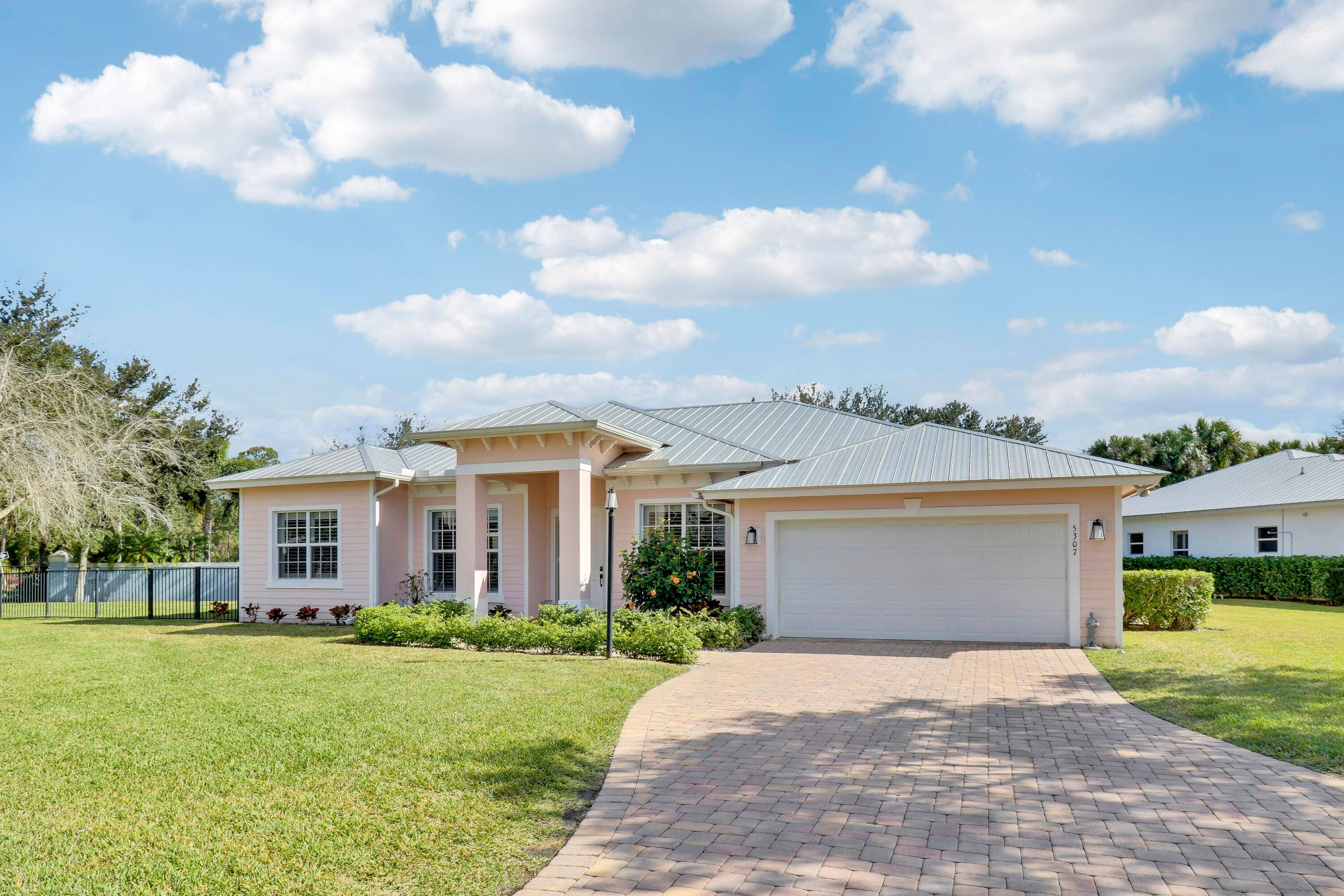 This Partially Furnished move in ready Key West home built in 2017 in Osprey Ridge is a meticulously maintained 4 BR, 3 bath home shows like the model.