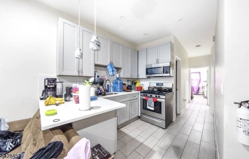 Don't miss this income producing 2 family property with incredible potential.