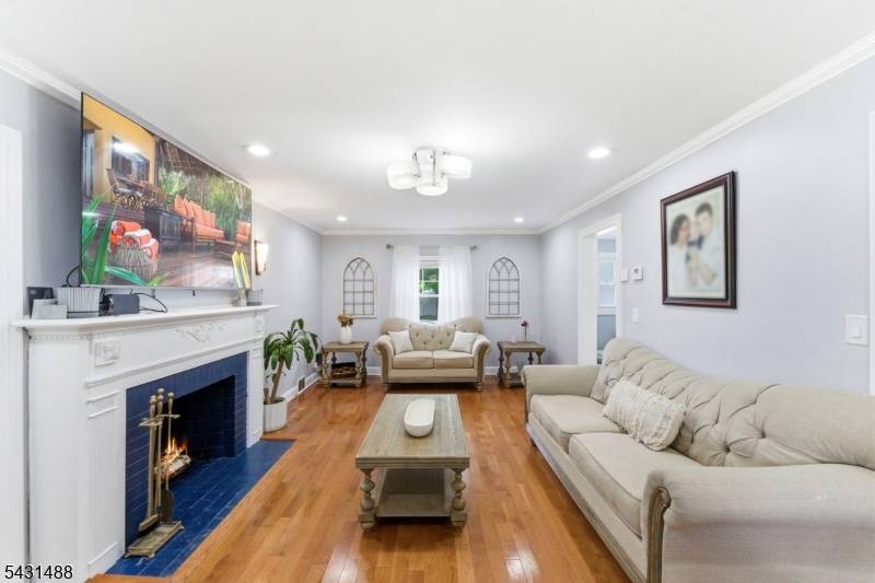Welcome to this beautifully renovated Colonial nestled in the heart of Orange.
