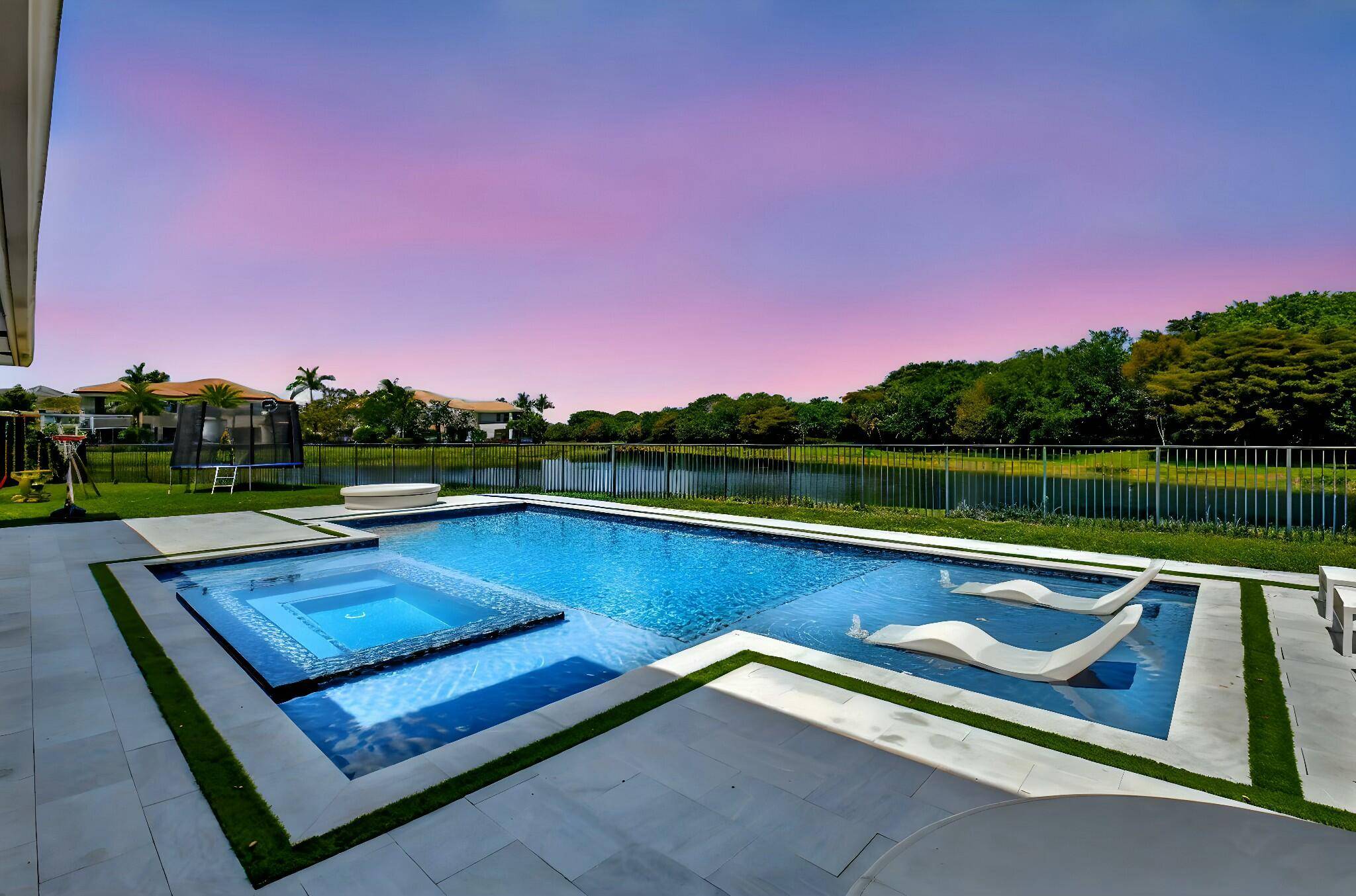 Experience jaw dropping sunsets from this 4Bed Office 4Bath home on a premium pie lot with 500k in upgrades in Seven Bridges.