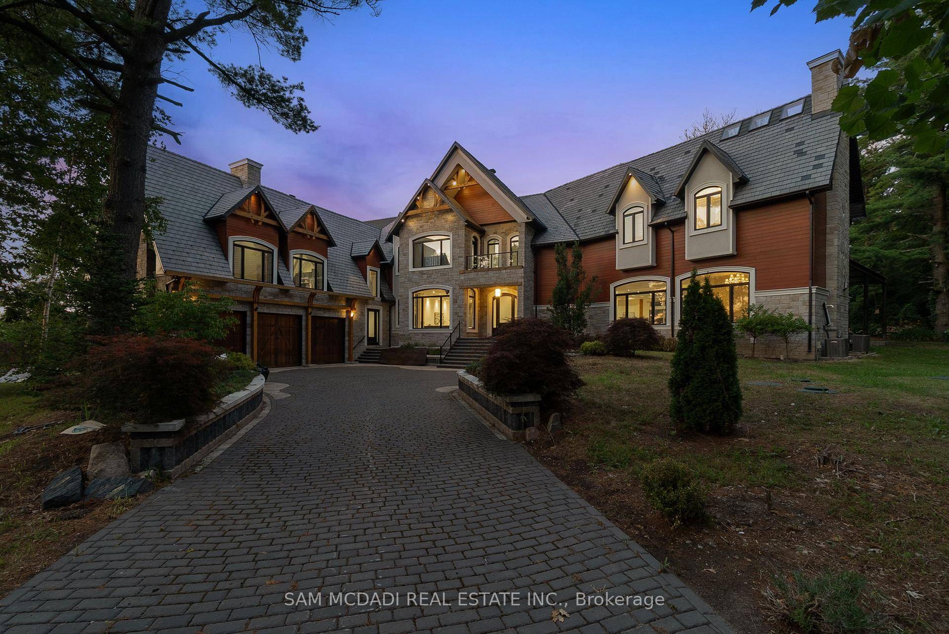 Set on a secluded almost 2 acre estate, this newly constructed architectural masterpiece offers over 13, 000 square feet of refined indoor outdoor living.