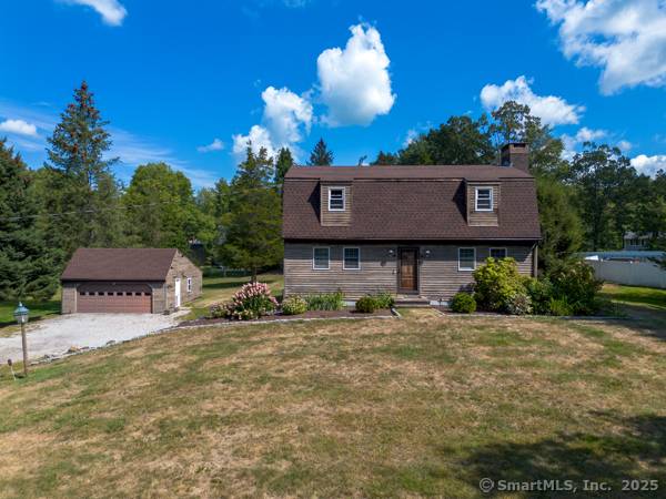 This 7 room gambrel colonial is the perfect mix of charm and updates !