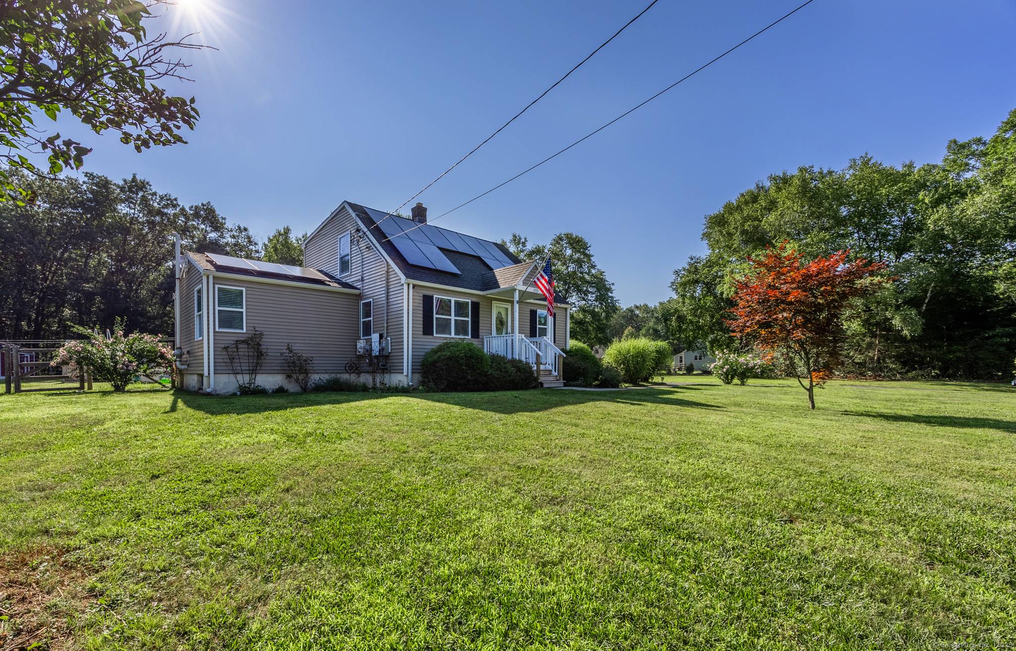Welcome to this beautifully updated 4 bedroom Cape Cod style home, set on 2.