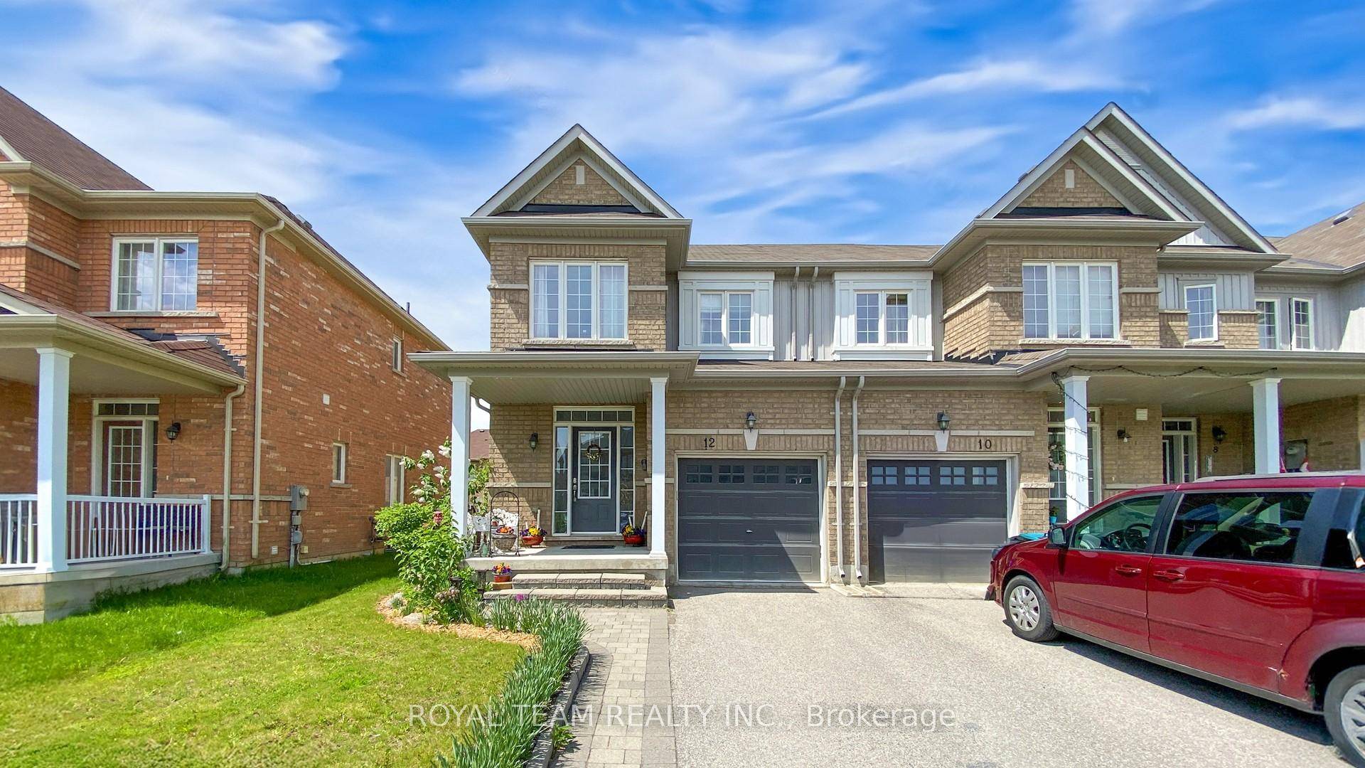 This Charming and Bright 3Br Freehold Townhome Is a End Unit feels like a semi in Bradford's Parkview Heights neighborhood.