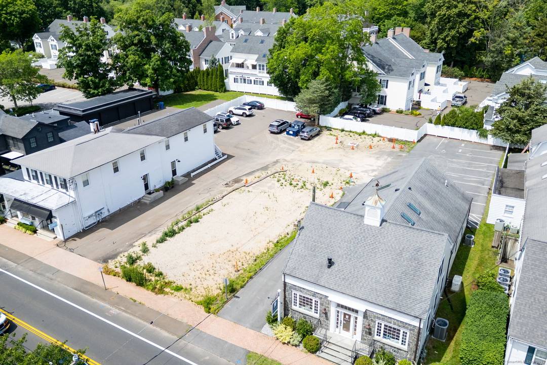 Fully approved and ready to go, this exceptional commercial lot is situated in the heart of vibrant downtown Madison.