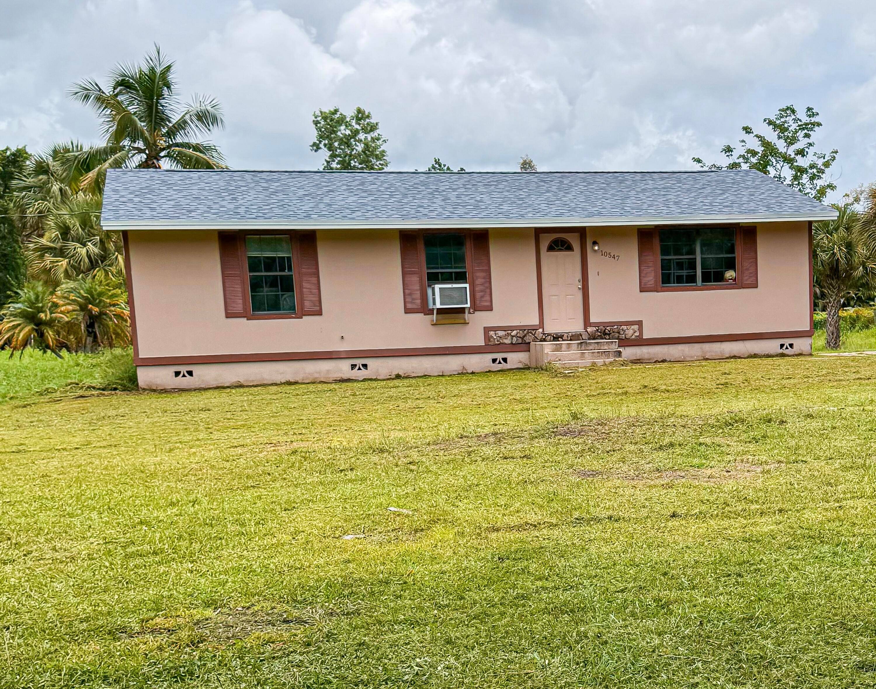 Great investment property in Jupiter Farms NO Restrictions or HOA, sitting on a beautiful 1.