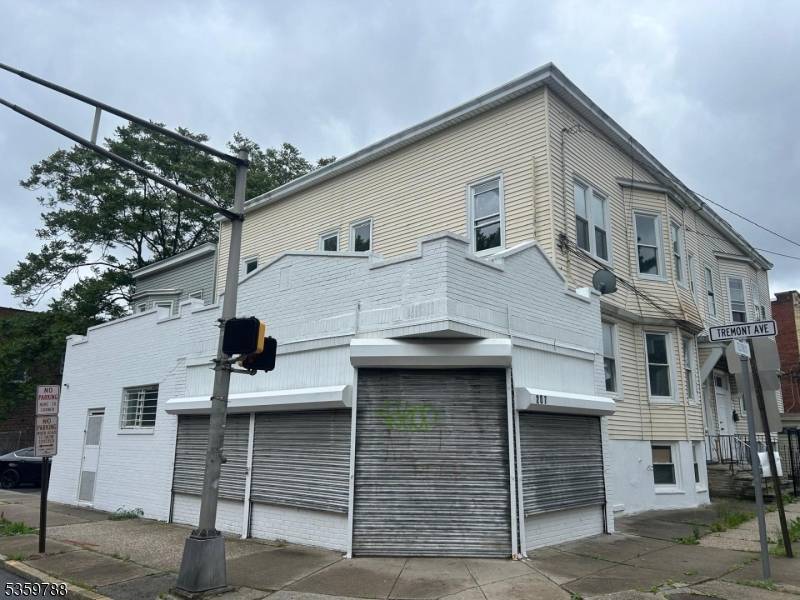 Vacant renovated 2 Family with commercial space on street level ready for a restaurant across from house of prayer and school !