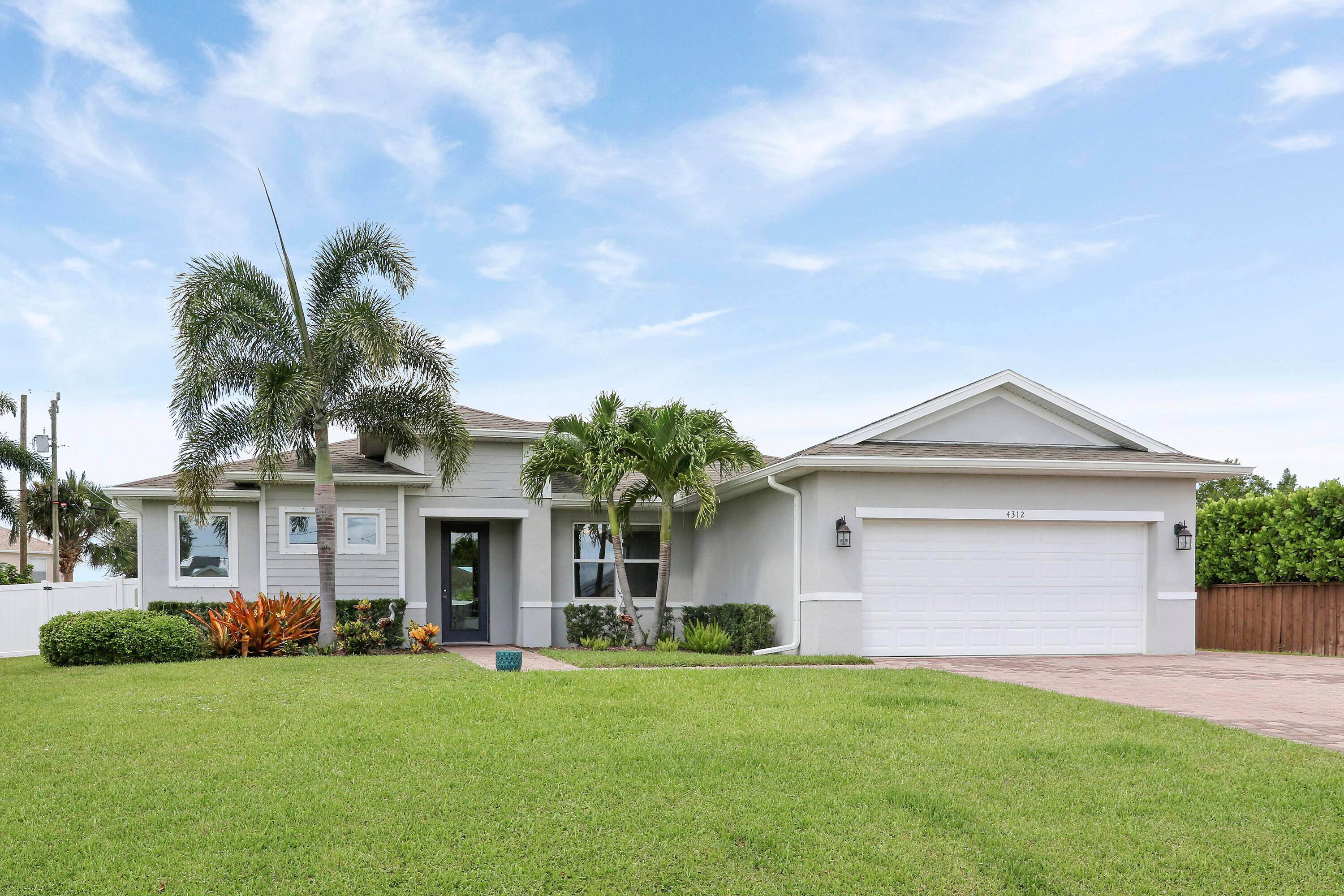 Welcome to this stunning CBS home with 10 ft ceilings, 9 ft doorways, and oversized closets !
