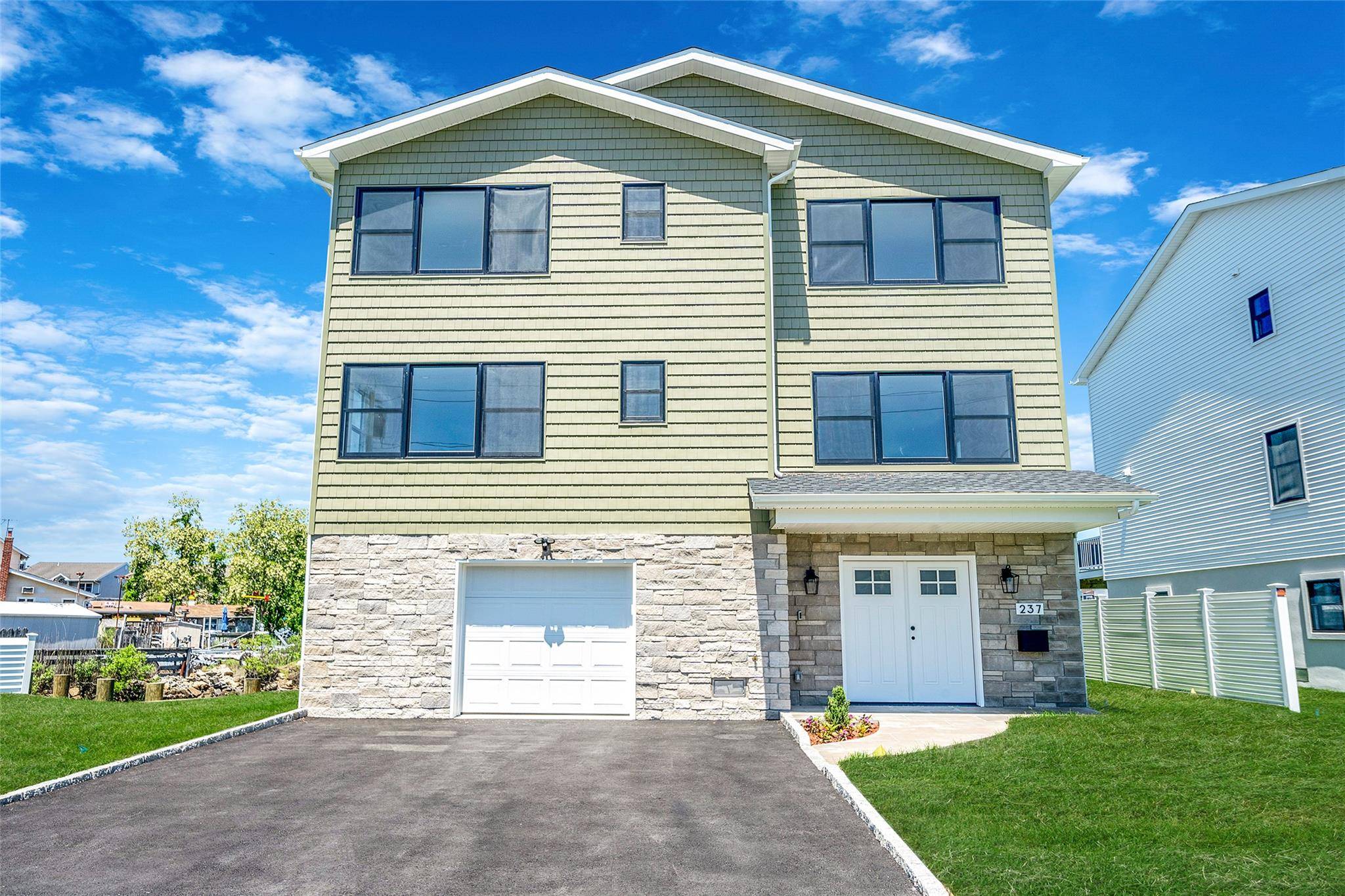 WELCOME TO 237 MOTT ST, A 2025 NEW CONSTRUCTION HOME THAT IS BUILT ON A 10, 477 SQ FT LOT 109x121 IRR.