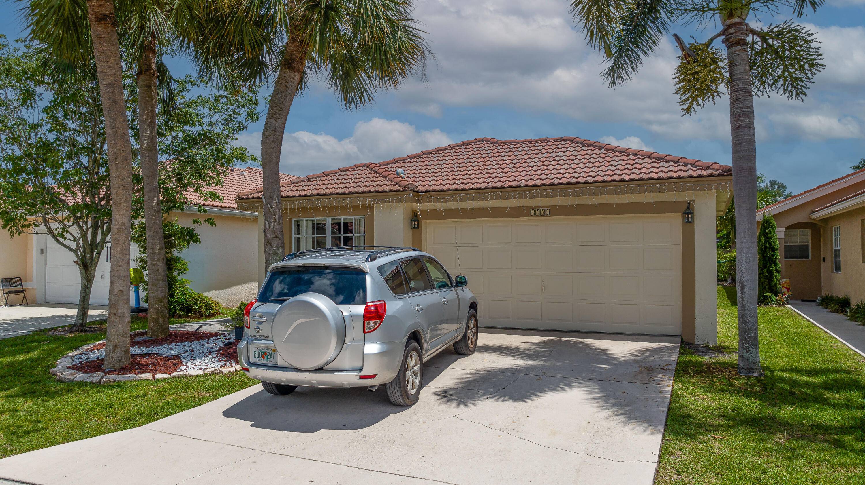This family home located in the highly desirable gated community of Nautica Sound features an open floor plan with vaulted ceilings.
