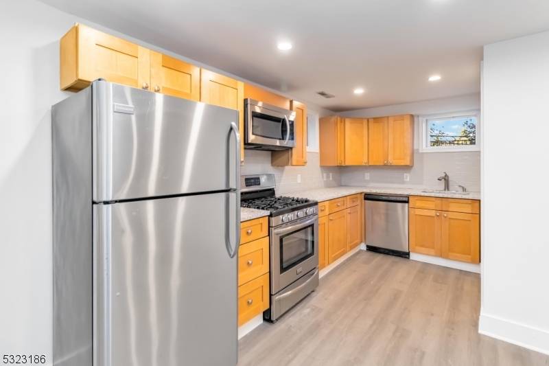 Welcome to this COMPLETELY RENOVATED Duplex unit featuring 3 spacious bedrooms and 2 stylish bathrooms.