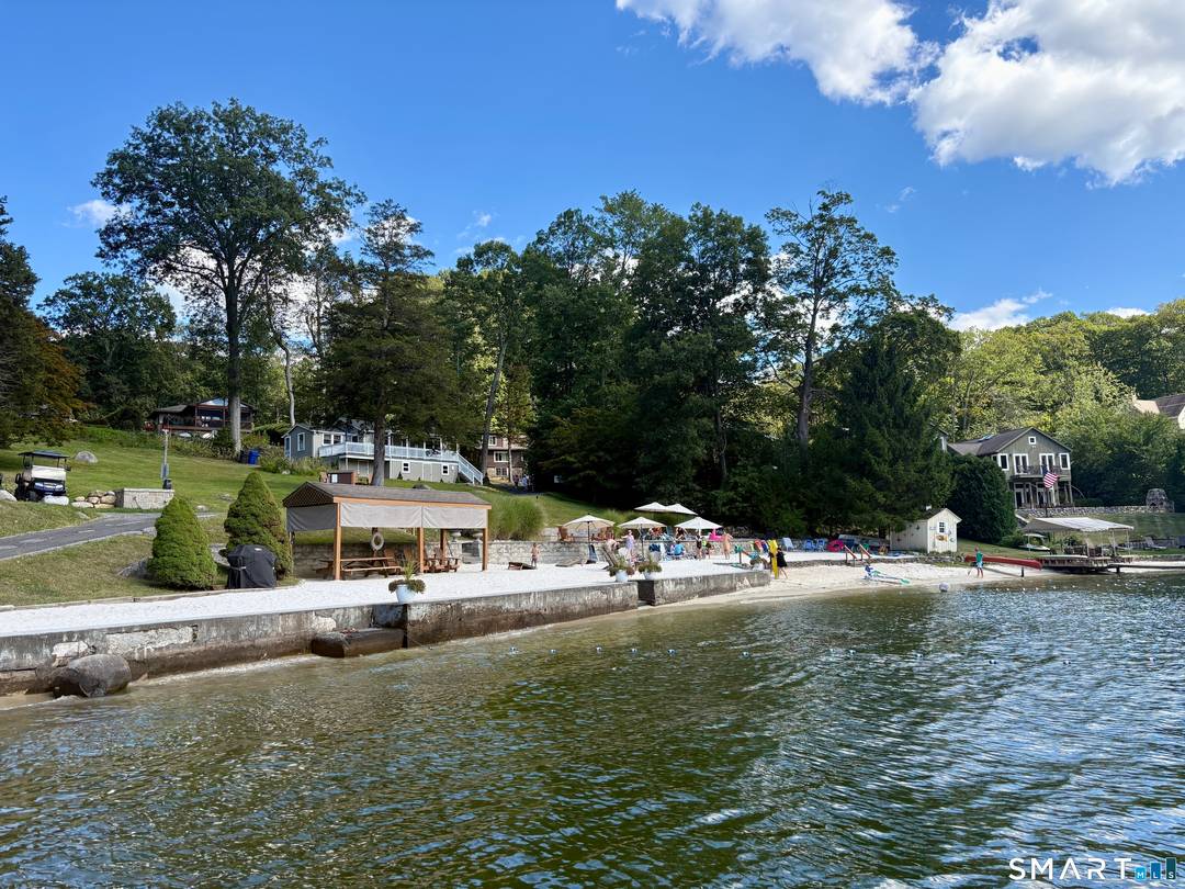 Set within the sought after Candlewood Trails community on Lake Candlewood, this rare offering presents an exceptional opportunity to create a custom lake lifestyle just moments from the water.