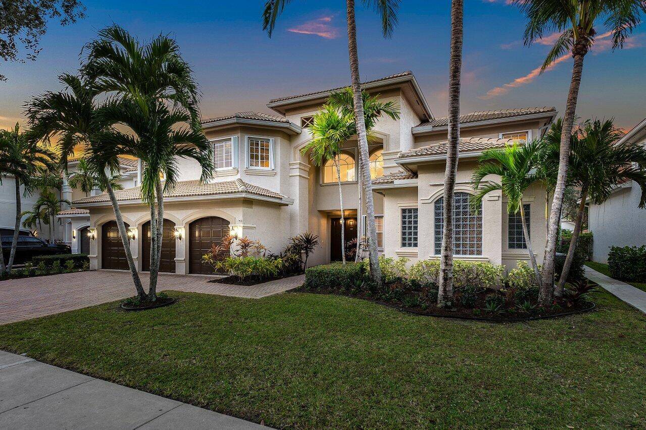 Magnificent 6 Bedroom plus office Estate Home nestled in one of the most popular communities of West Boynton Beach !