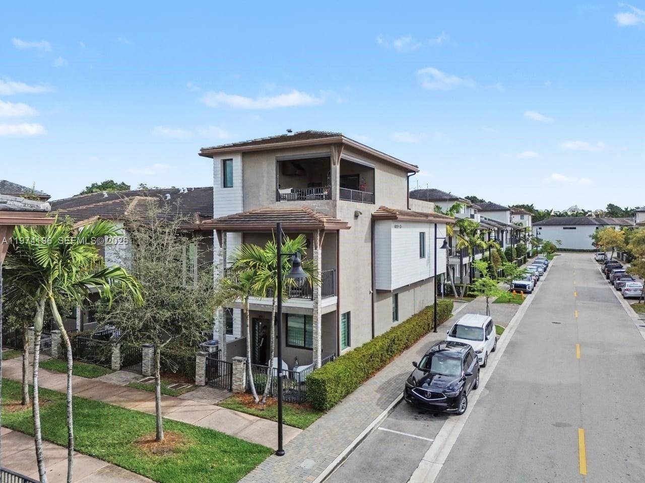 Welcome to this beautifully maintained 3 story townhouse in the highly sought after Downtown Doral.
