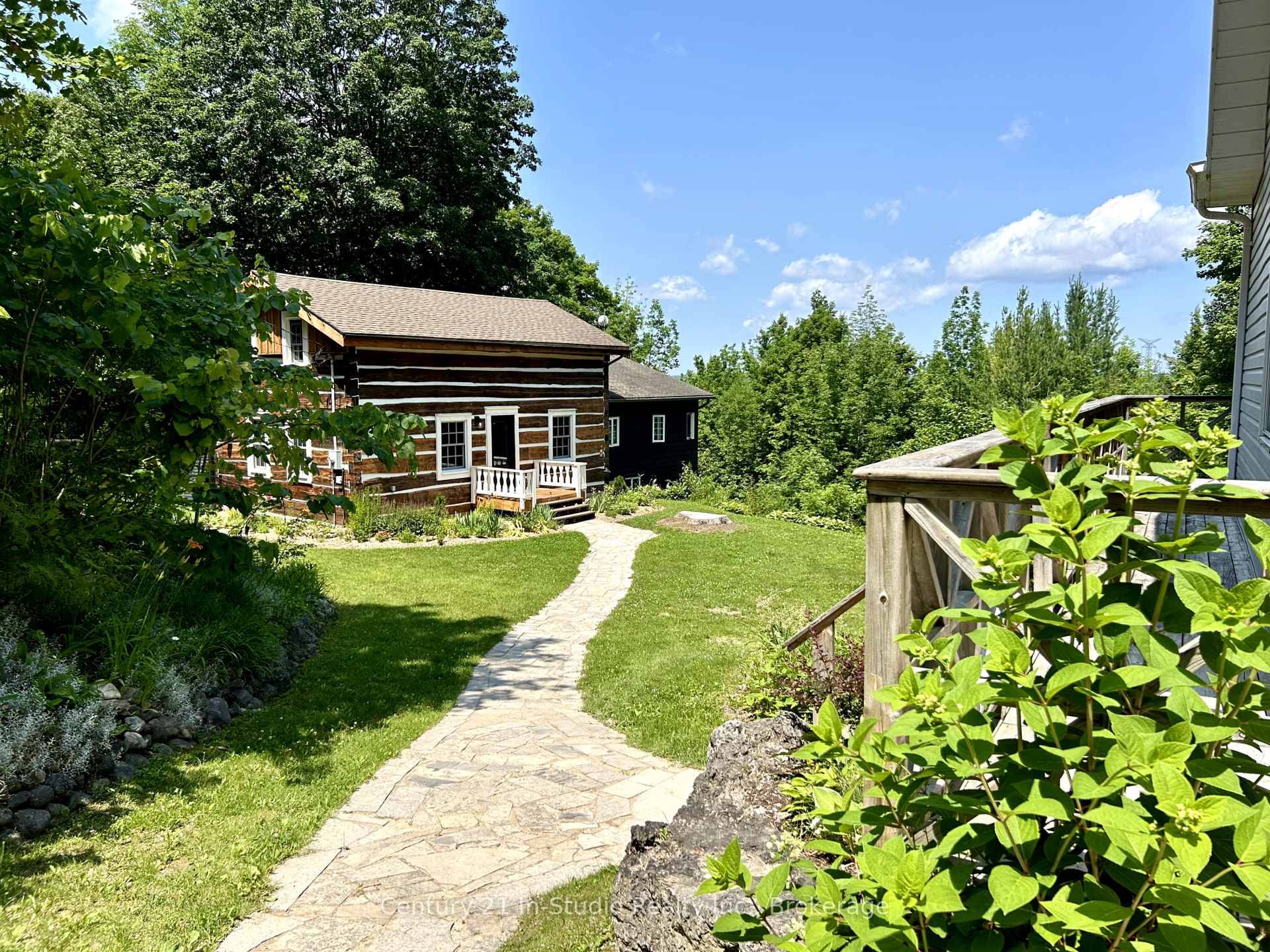 Tucked away on 16. 1 peaceful acres near the 450 acre Allan Park Conservation Area, this updated log home with a modern addition combines rustic charm with contemporary comfort.