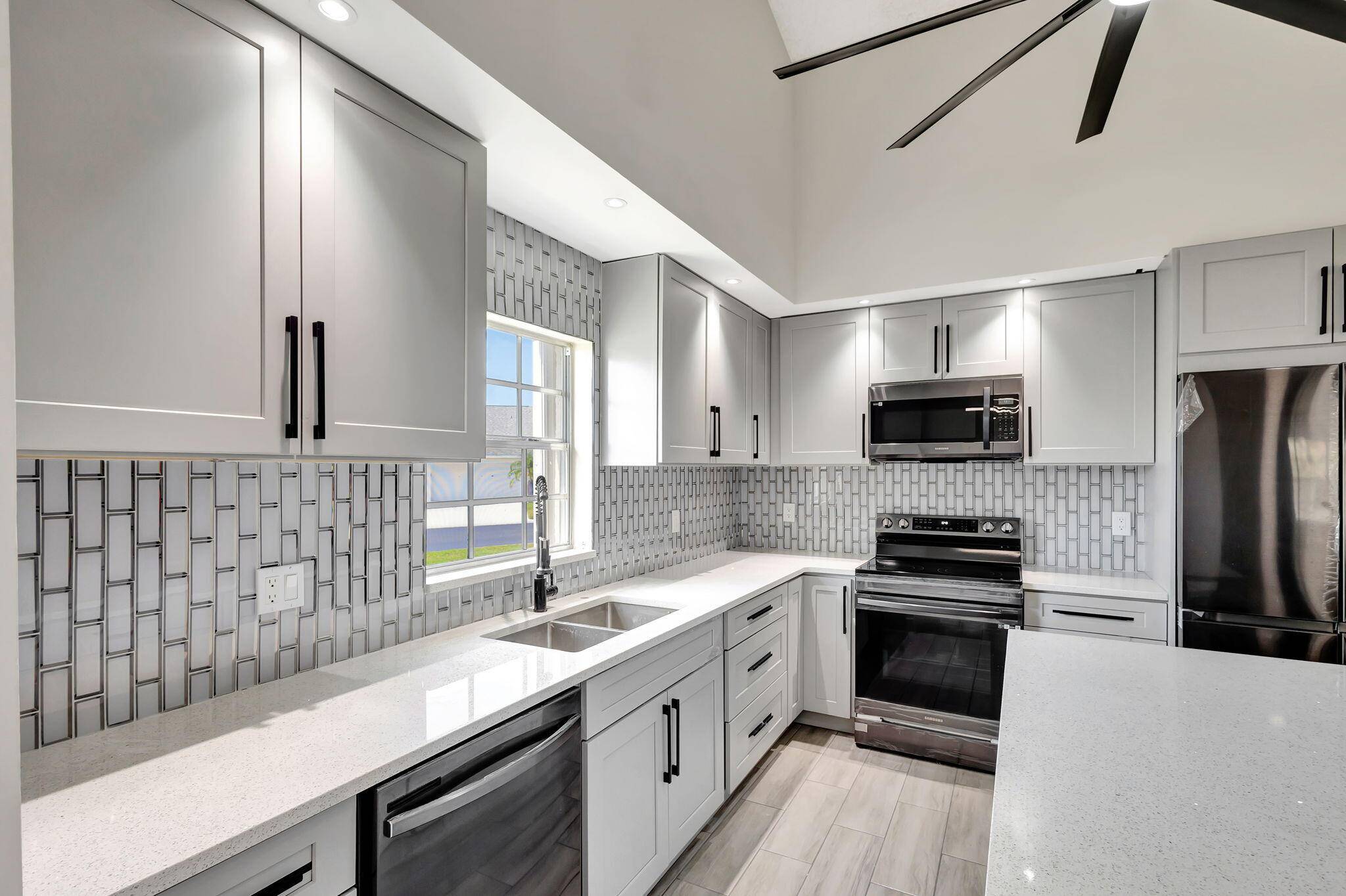 Fully updated and never lived in, this stunning 2 bedroom, 2 bathroom PLUS DEN !