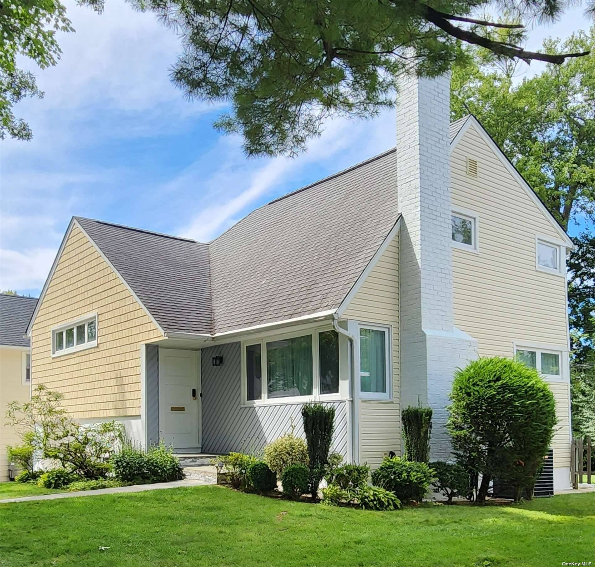 Updated Split level home with Hardwood Floors Throughout.