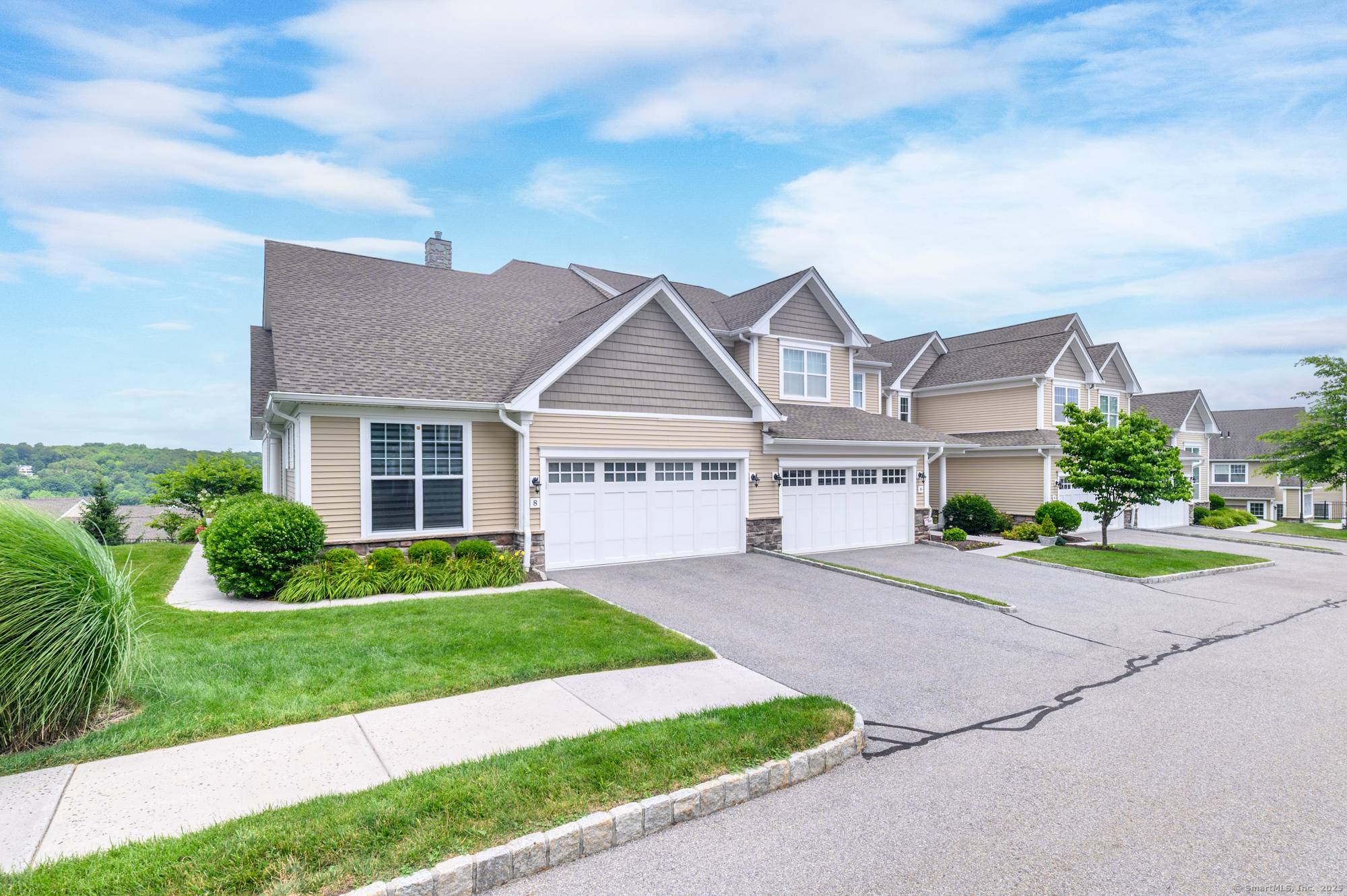 A rare and refined end unit in one of Danbury's most sought after communities, perfectly positioned to capture sweeping mountain views, the light of sunrises, and the gorgeous glow of ...