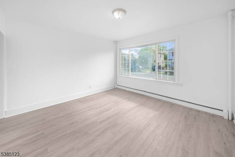 An incredible opportunity awaits with this income producing two family home, ideally located just minutes from the Woodbridge Train Station.