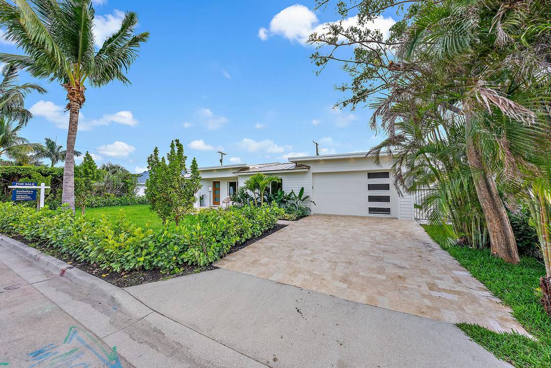 Coastal, chic home with fabulous chef's kitchen featuring gas stove, refrigeration columns, double oven, 2 sinks and ample island with honed quartzite countertops overlooking the brand new swimming pool and ...
