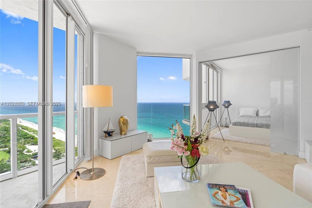 This penthouse condo sits steps from the beach, boardwalk, and the stunning Ocean Terrace Park.