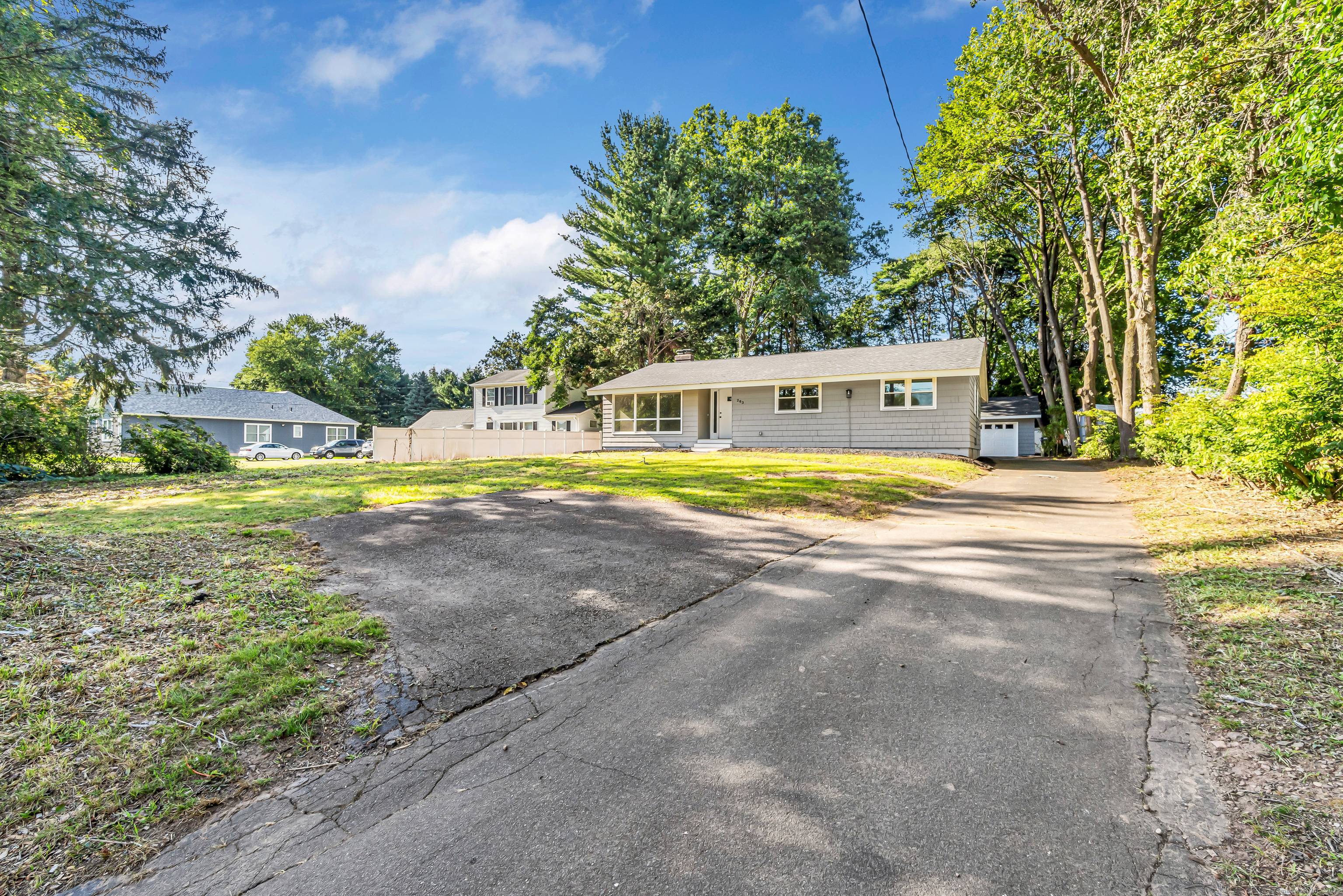 Pulling up to 263 Two Rod Highway, you're greeted by a classic ranch style home set back on nearly an acre of land.