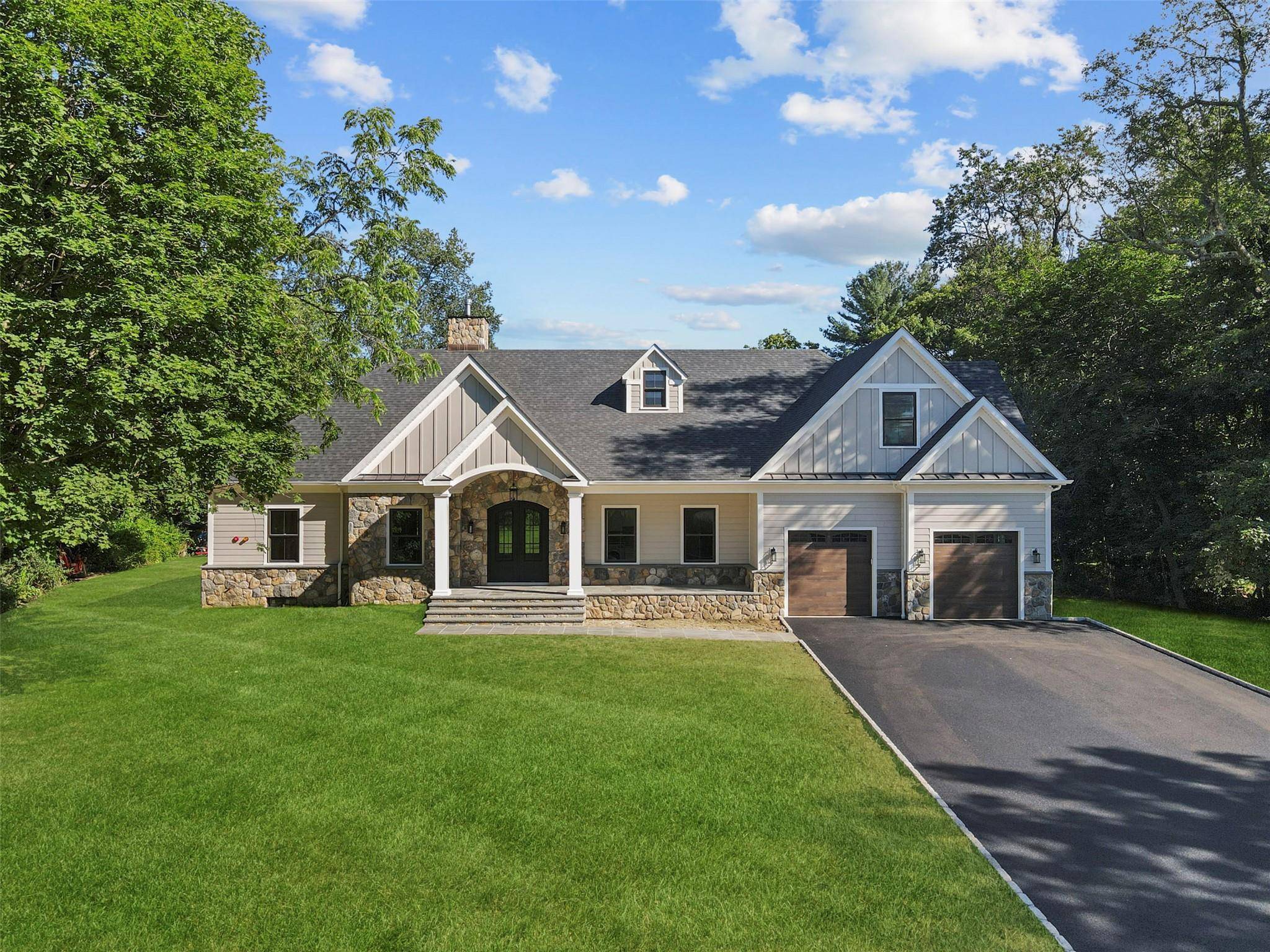 Brand New Construction in the award winning Chappaqua School District set on over one level acre.